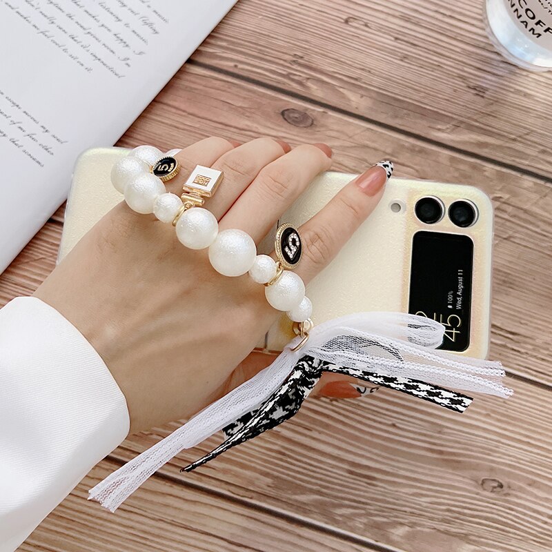 Premium luxury Cute Pearl Hand Chain Pendant Hard Laser Phone Case for Samsung Galaxy Z Flip 3